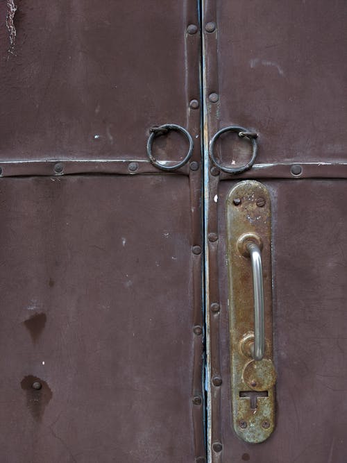 Brown Metal Door with Rusty Handle 