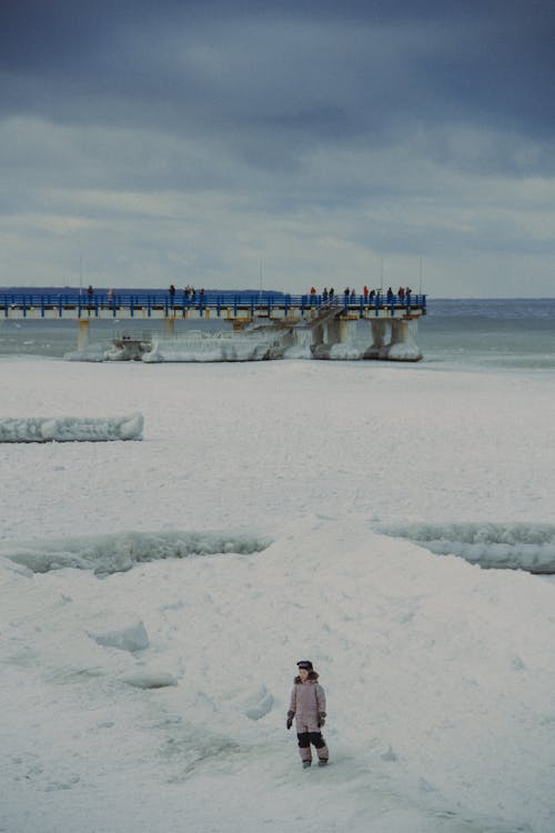 Snow Covered Coastal Area Near the Concrete Pier