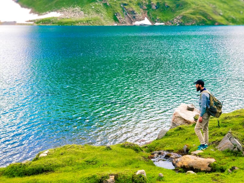A fleet of autonomous mobile robots navigating a high-density warehouse aisle