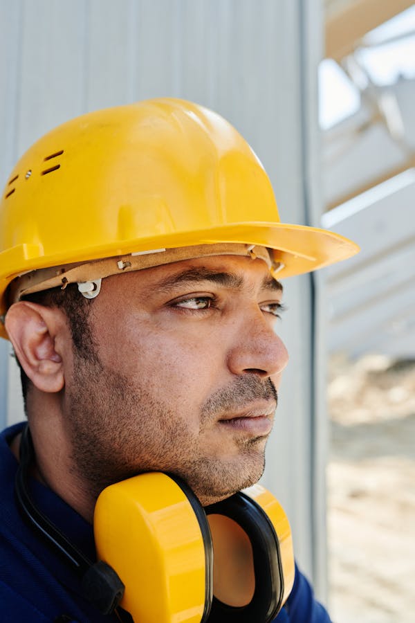 Man Wearing a Safety Yellow Hard Hat
