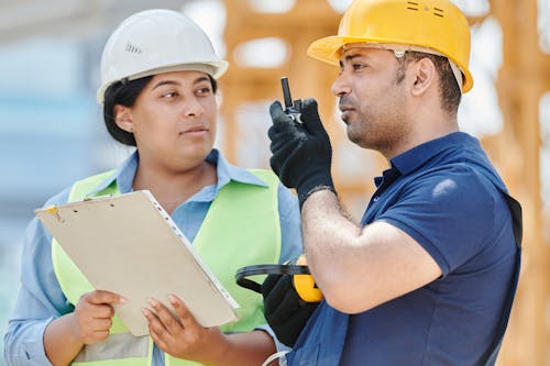 Free Construction Workers Wearing Hardhats Stock Photo