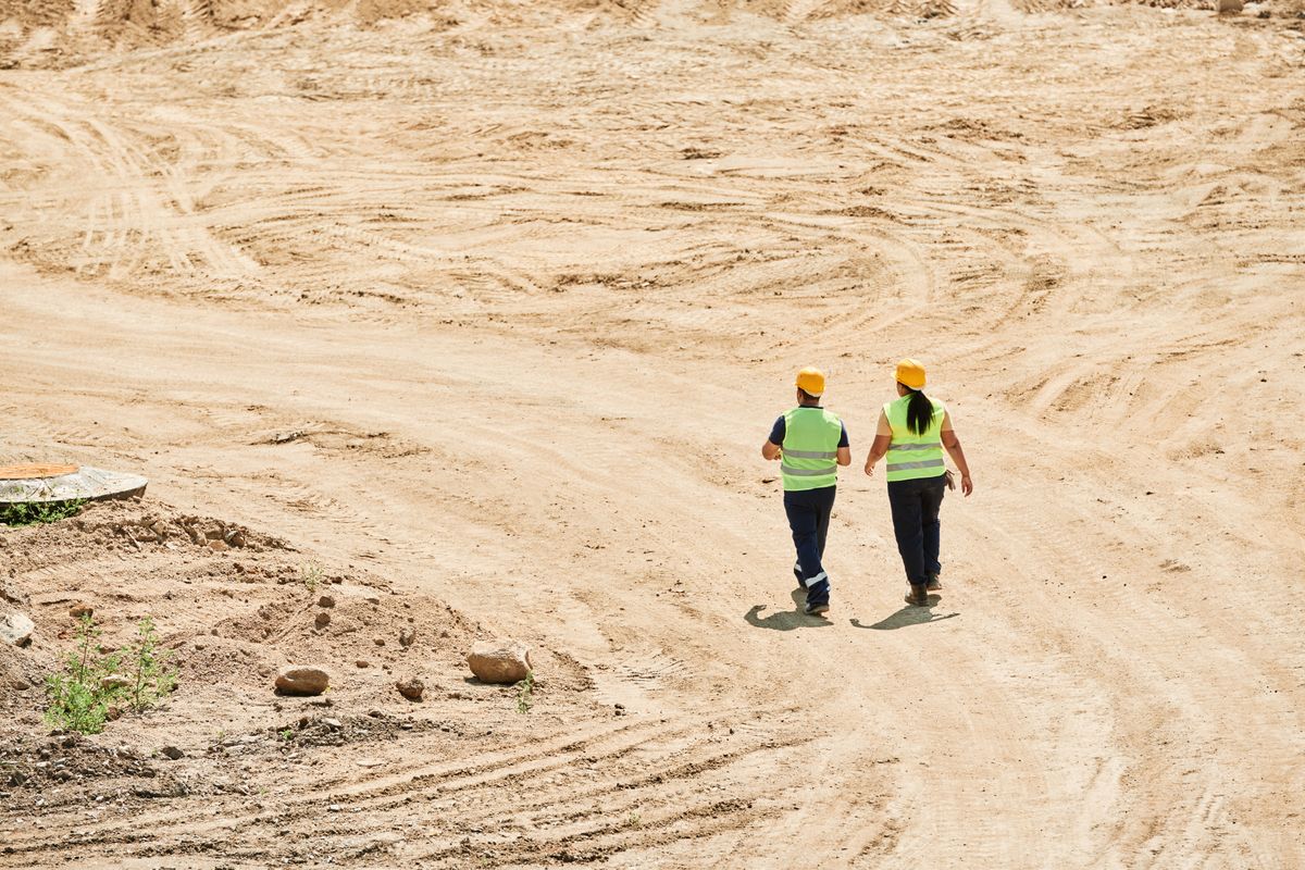 Engineers walking a commercial construction site