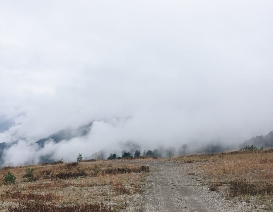Professional technician installing a security camera system on a residential property