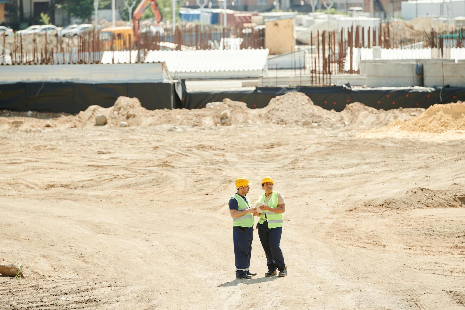 People with Hard Hard Standing on the Construction Site