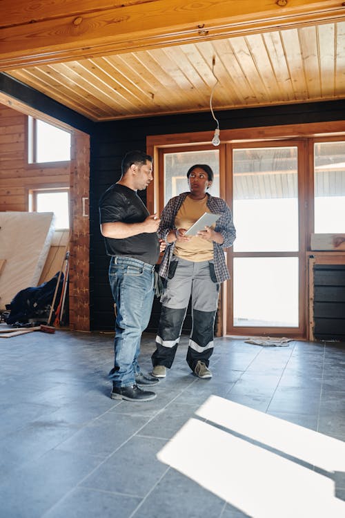 Free Two People Checking on a Construction Project Stock Photo