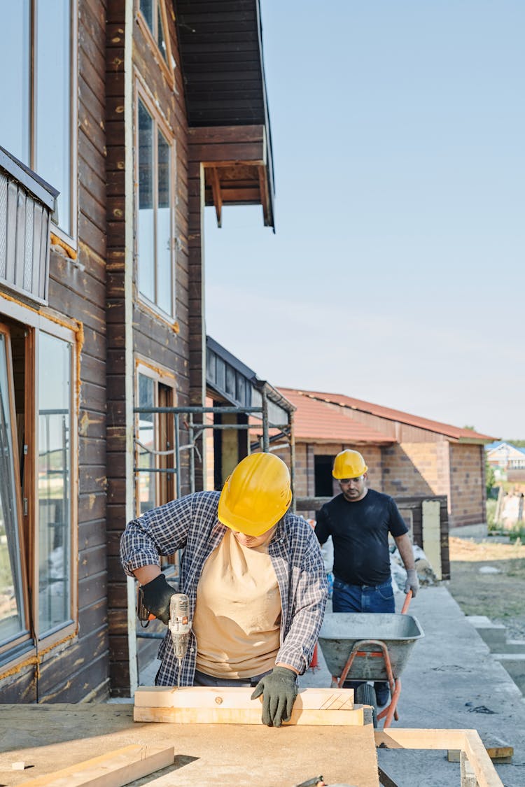 People Doing Work In The Construction Site