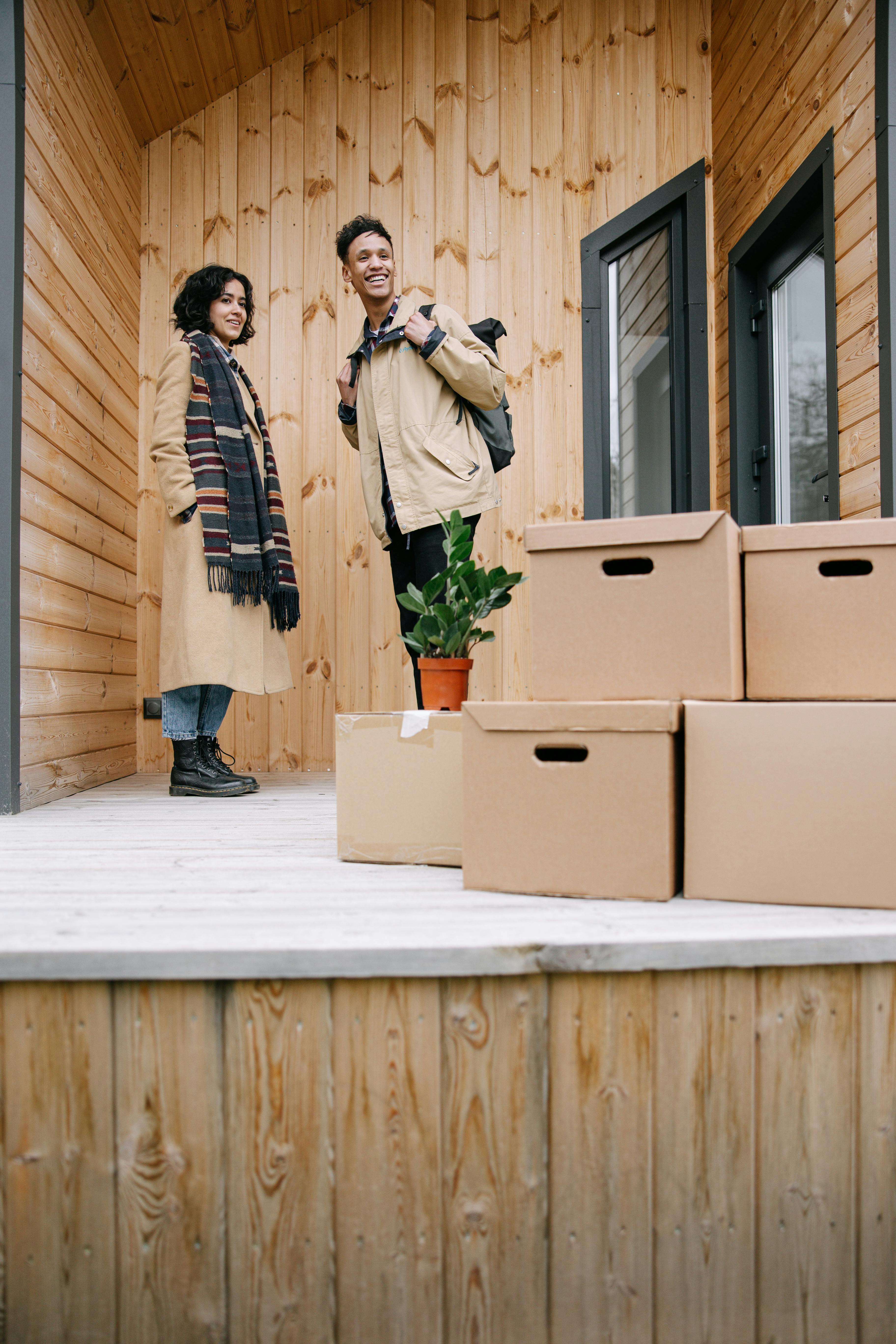 stacked of cardboard boxes in front of the door