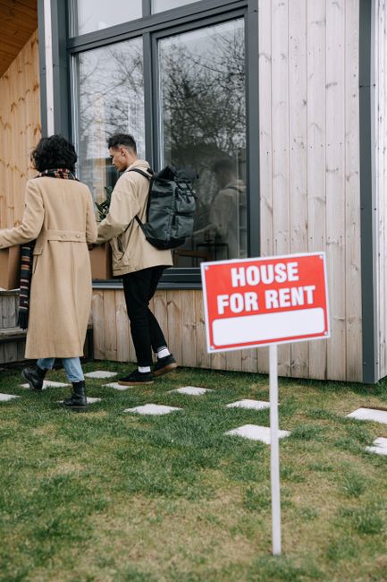 group of heirs discussing property sale options with a real estate professional