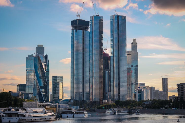 Tall Glass Buildings Under Blue Sky