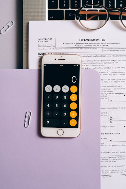 A Close-Up Shot of a Smartphone with an Open Calculator App