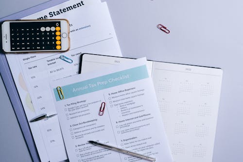 A Documents and Mobile Phone on the Table