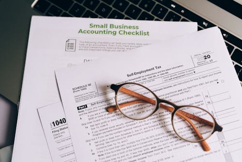 Free An Eyeglasses on Top of the Documents Stock Photo