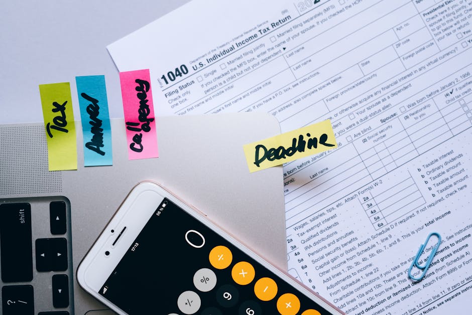 Calculator and financial documents spread on a desk - texas wrongful death attorney
