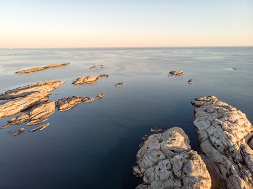 Photos gratuites de cailloux, ciel clair, côte