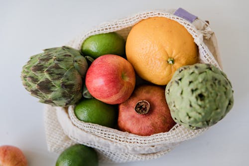 Assorted Fruits Inside the White Net Bag 