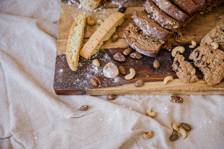 Cookies And Bread On A Wooden Board