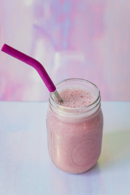 Clear Drinking Glass With Pink Liquid