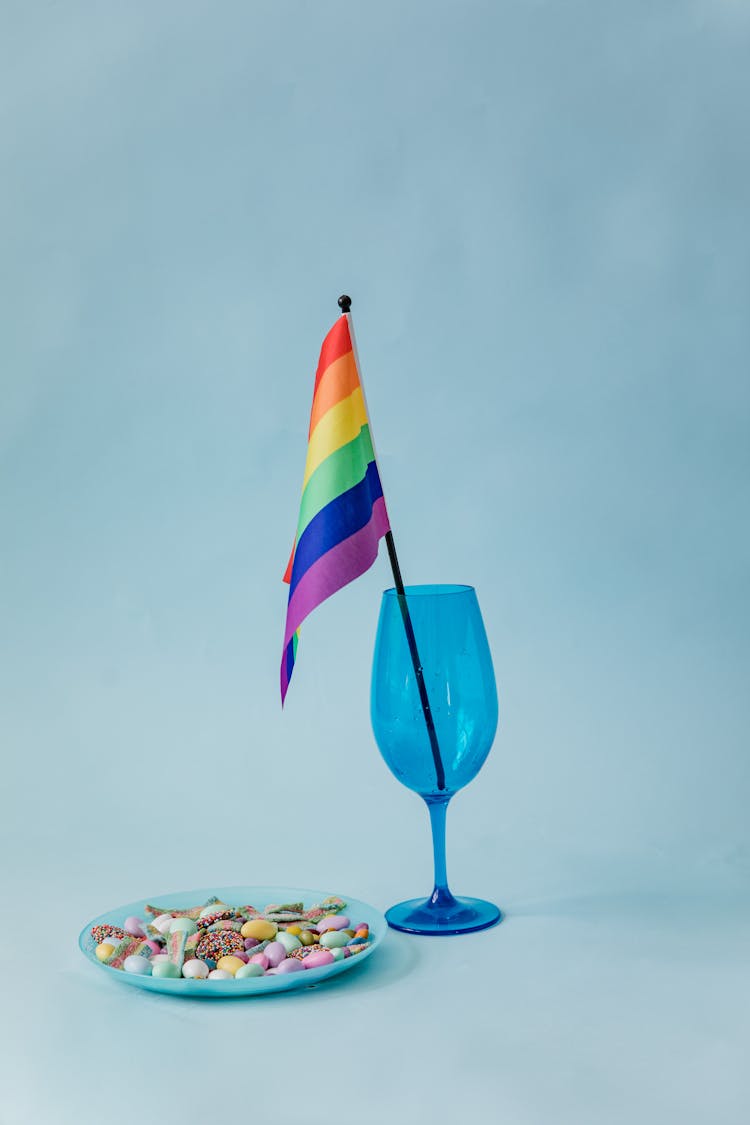 Rainbow Flag In Blue Glass