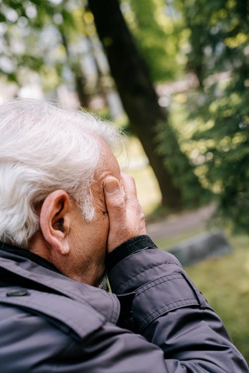 An Elderly Man Crying