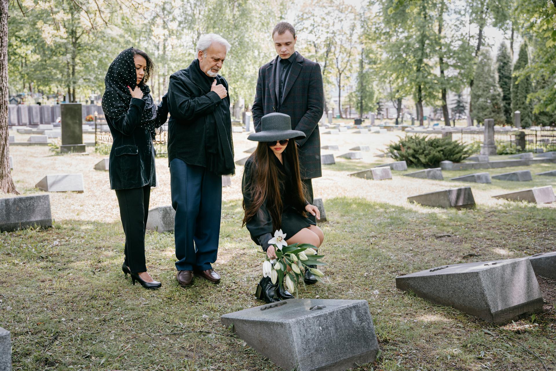 A Family Mourning in a Cemetery