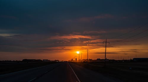 日出, 日落, 瀝青路面 的 免費圖庫相片