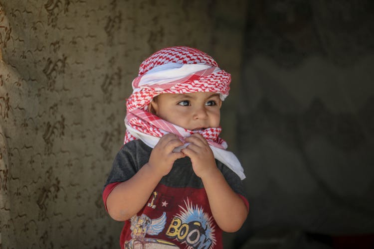 Child With Headscarf On Head