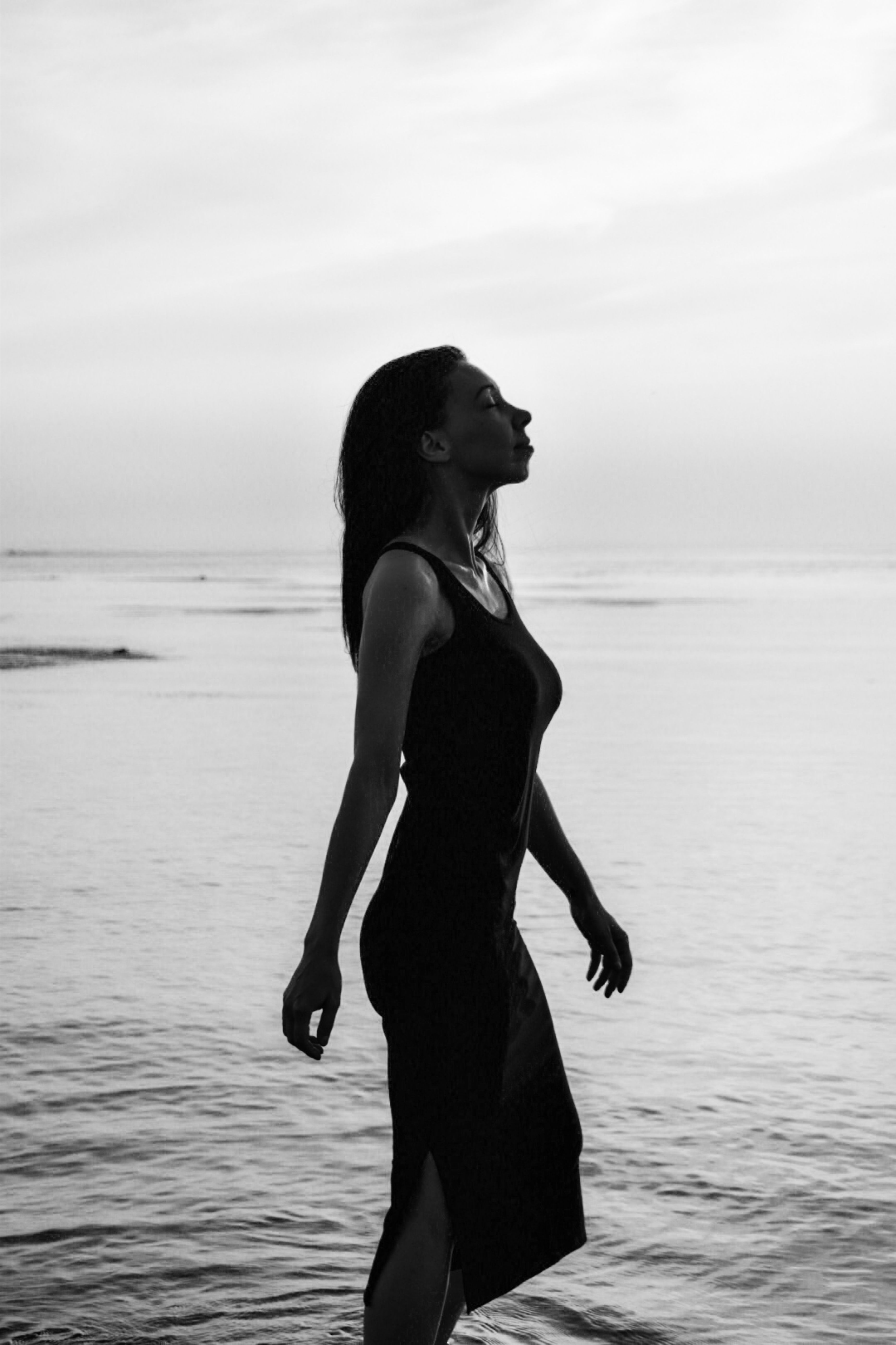 Grayscale Photo of a Woman in Long Dress Standing near the Water · Free ...
