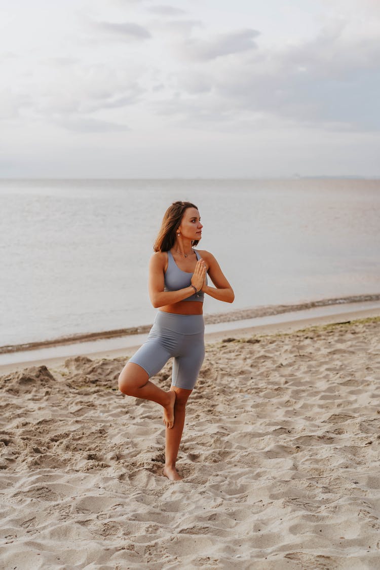 A Woman Doing The Tree Pose 