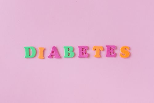 Free Colorful letters spelling 'diabetes' on a pink background, emphasizing health awareness. Stock Photo