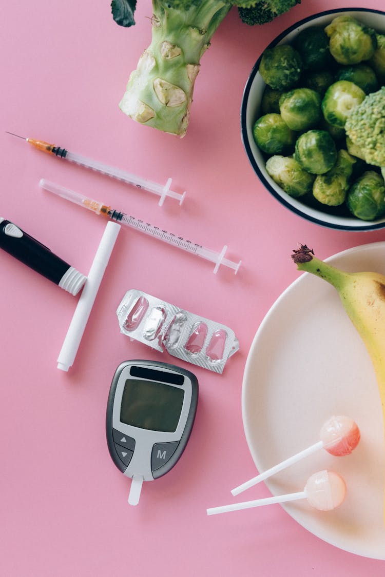 Glucometer On Pink Background