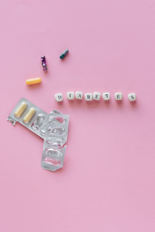 White and Black Letter Blocks on Pink Background