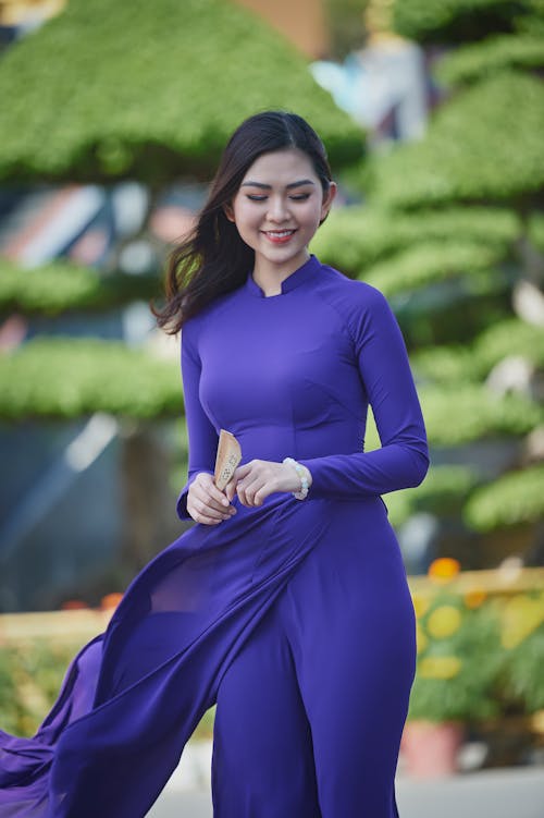 Woman in Blue Long Sleeve Clothing