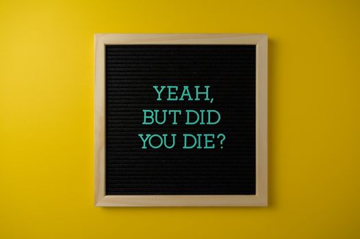 text on a wooden frame close up