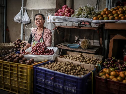 Free Woman Selling Fruits Stock Photo