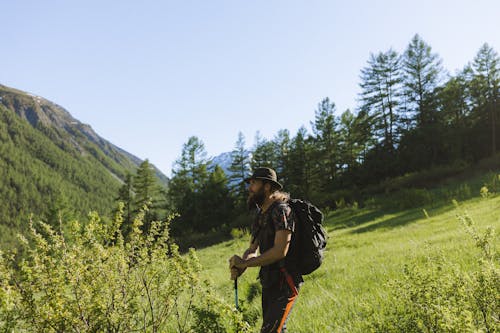 Man Carrying a Backpack Hiking