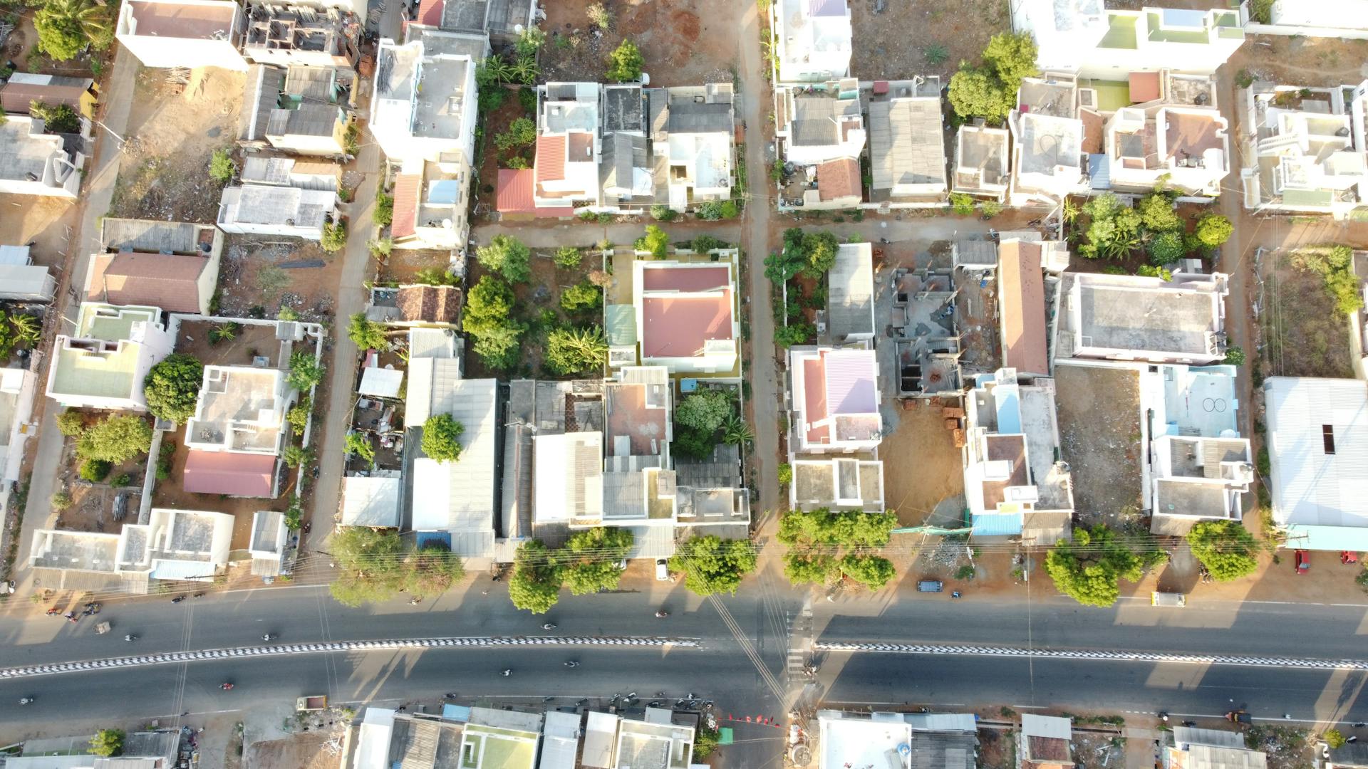 High angle view of Kadaparai, TN, India showing residential area and roads.