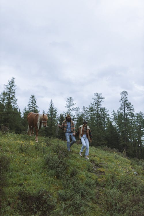 Couple Walking with a Horse