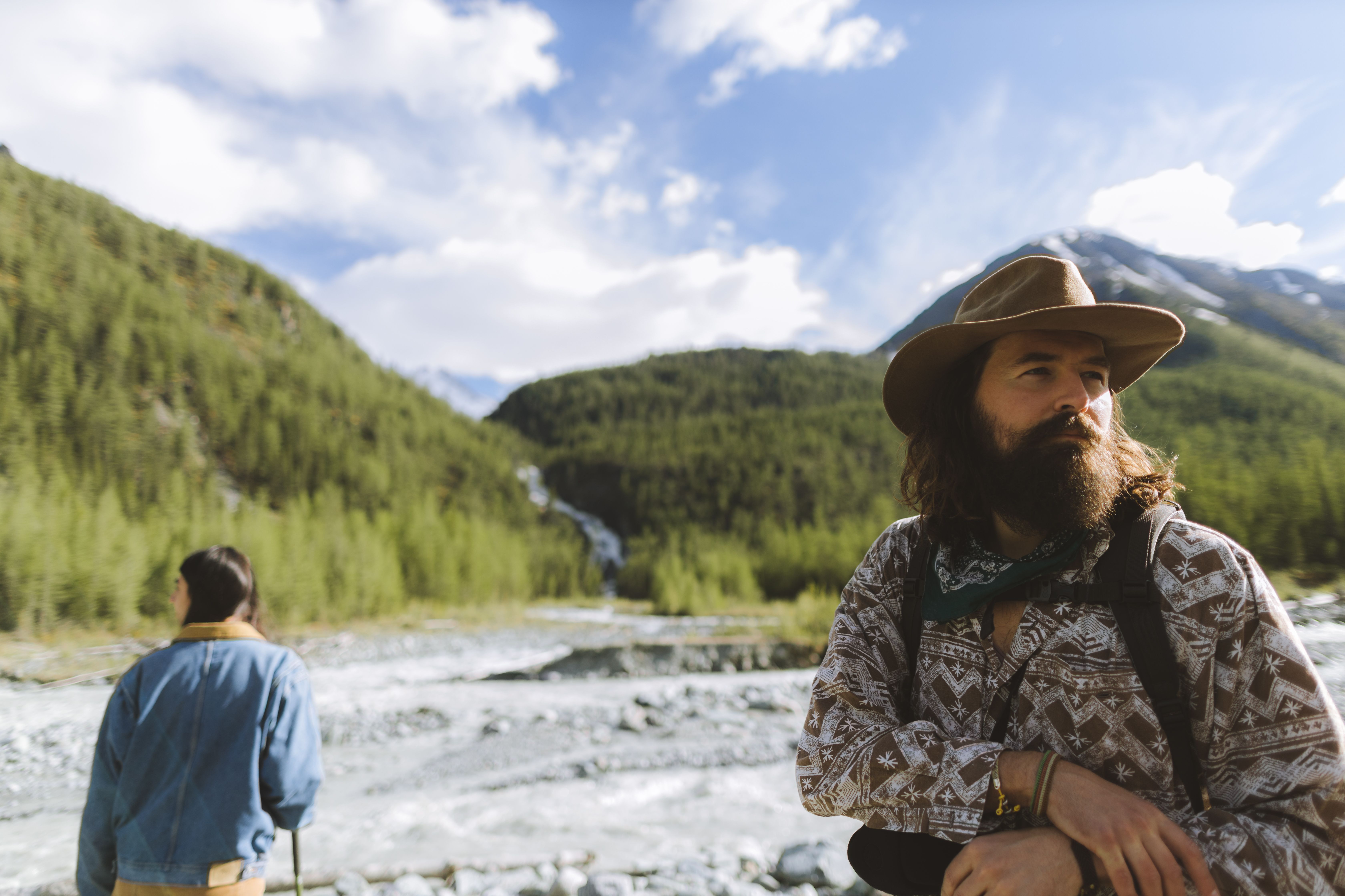 rugged outback trail with wide-brim sun protection cowboy hat