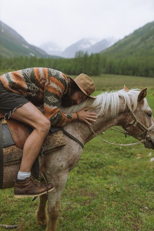 Man Riding a Horse