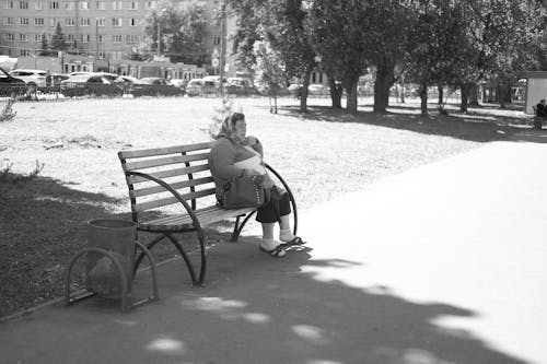 Old Woman Sitting on Bench