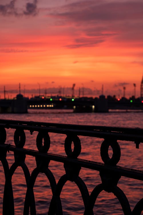 View of Ships in a Harbor at Sunset