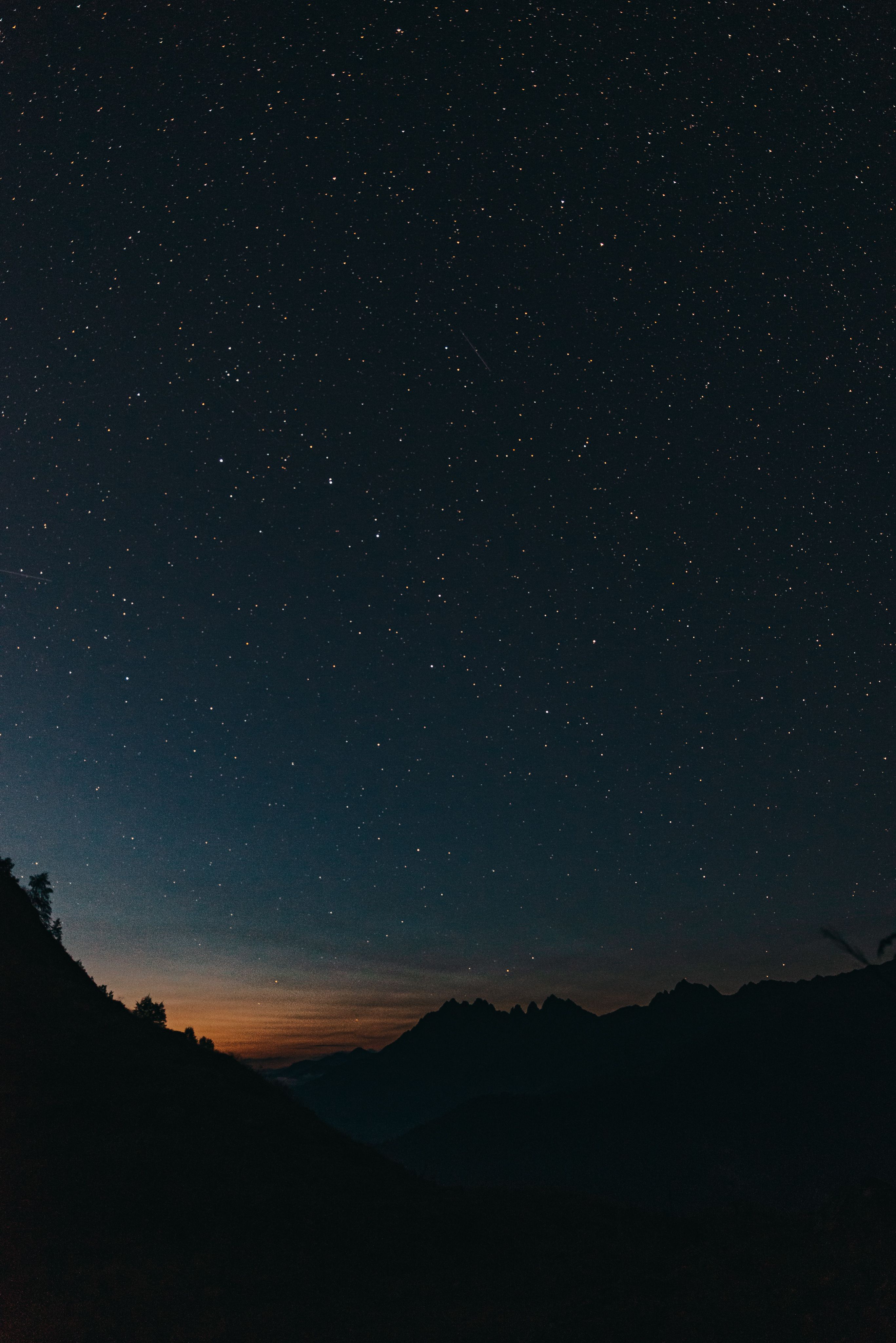 Mountain At Night Under A Starry Sky · Free Stock Photo
