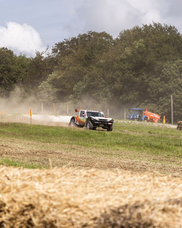 Rural Rally Racing Car Rallying on a Farm · Free Stock Photo