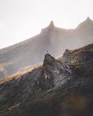 Black and Gray Mountain Under White Sky