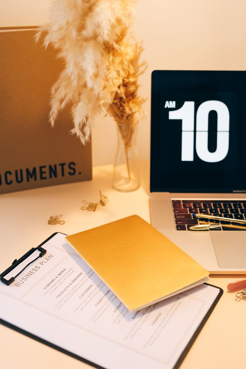 Professional reviewing online learning dashboard, certificates, and resume draft for certifications on resume 2026