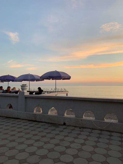 People Dining Al fresco at a Beachfront