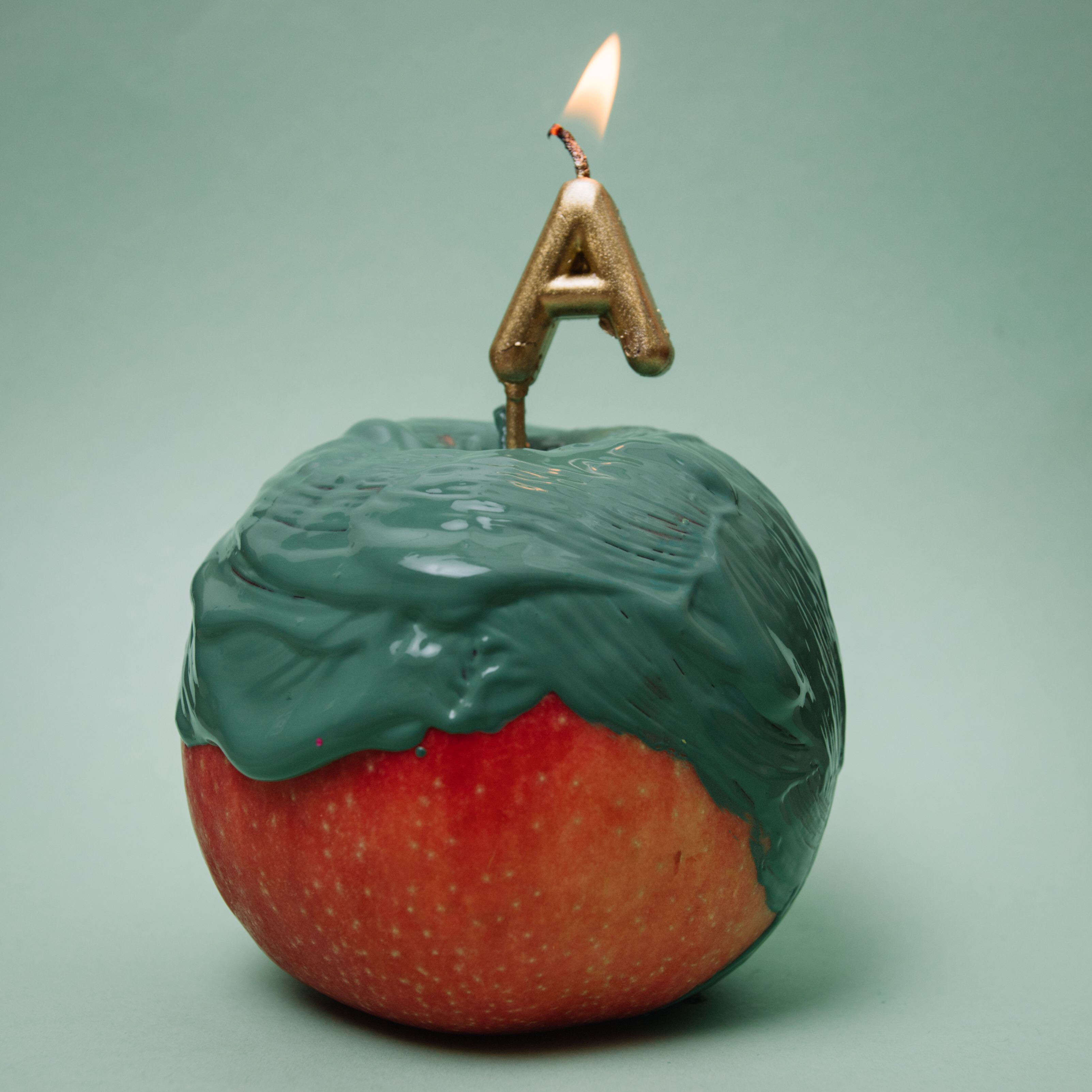 A Lighted Candle on Apple