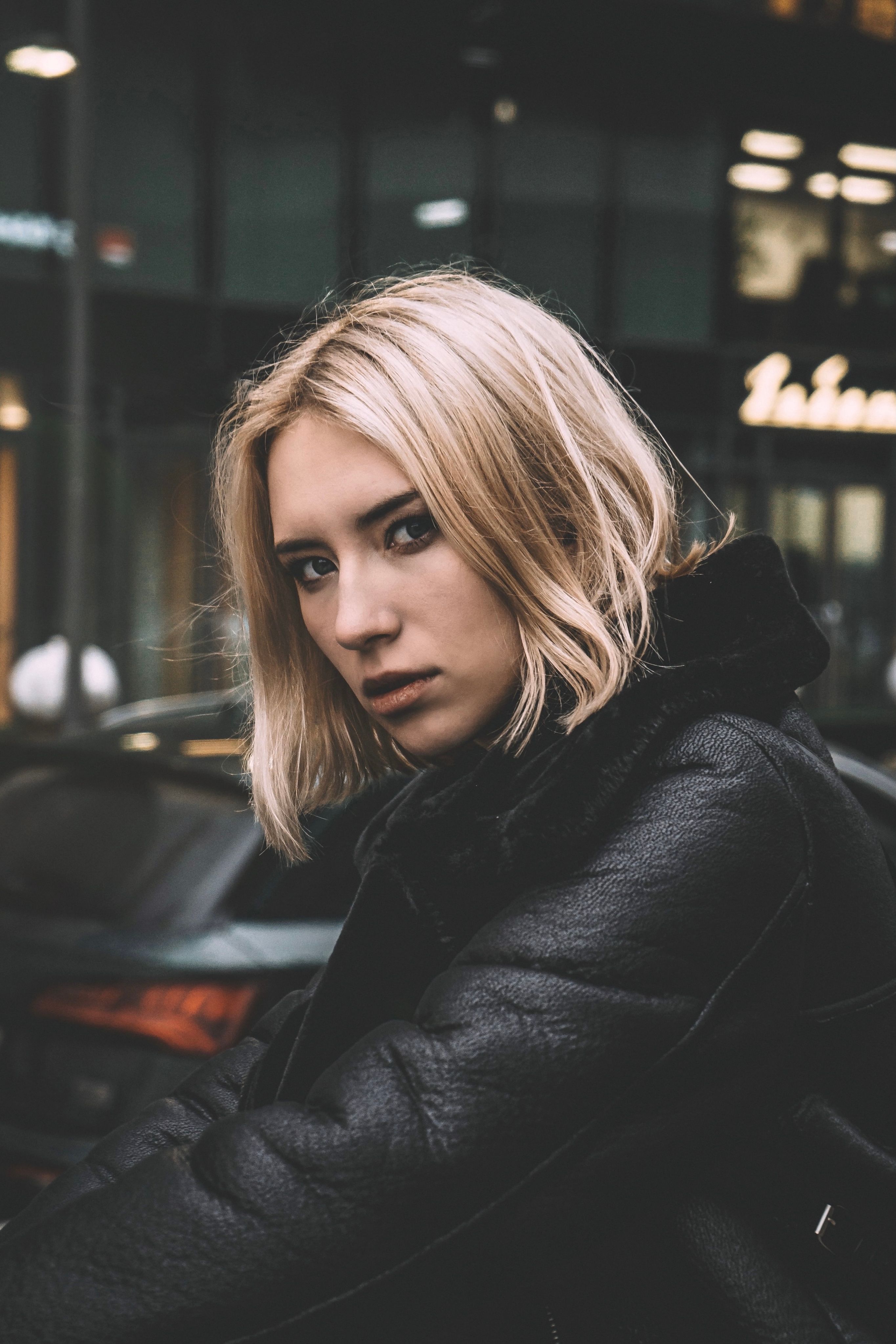 A Portrait of a Young Woman on the Street · Free Stock Photo