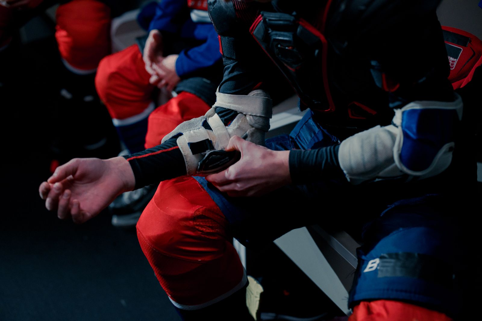 Runner tying athletic shoes before a walk, highlighting ankle and arch support needs