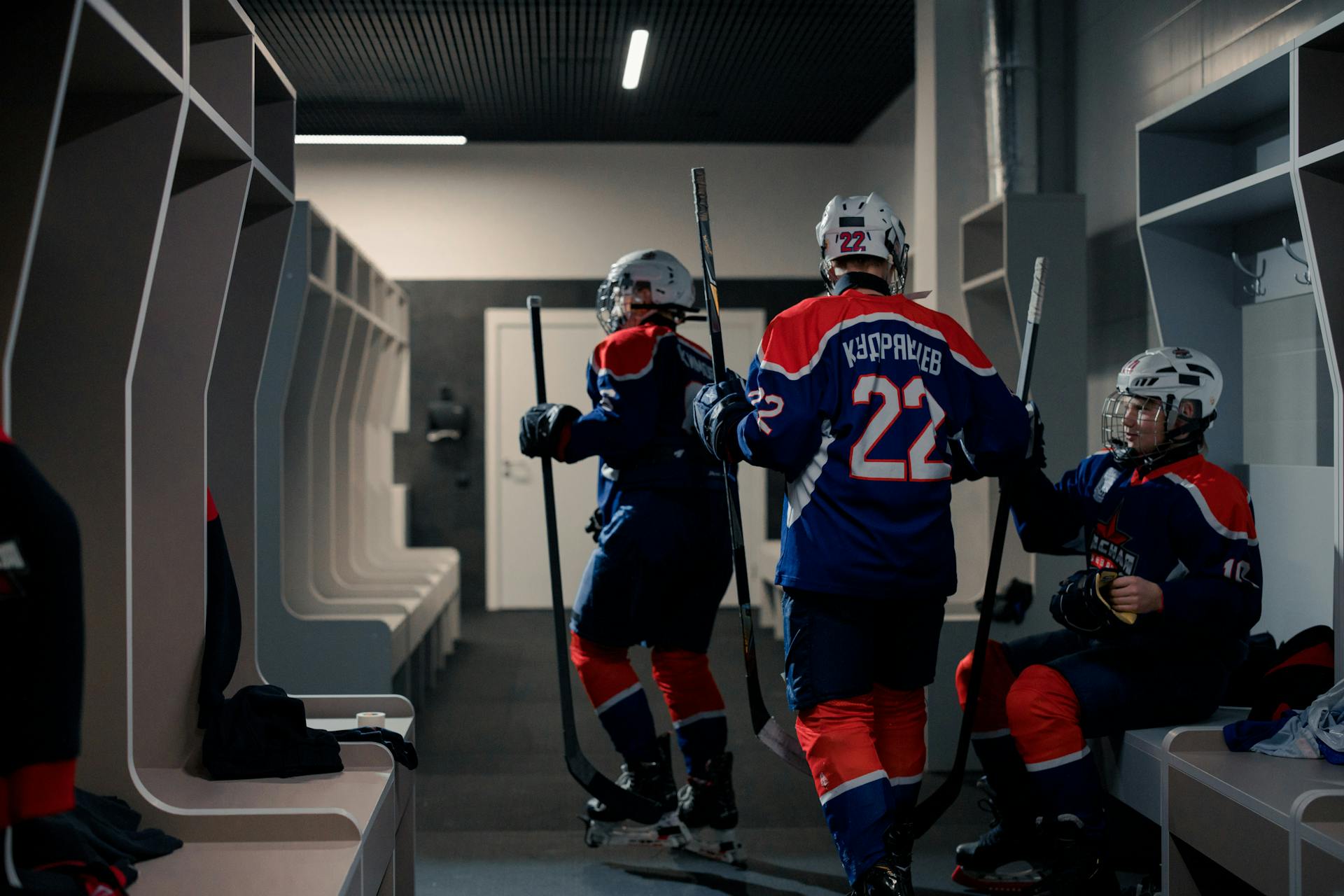 2 Men in Red and White Ice Hockey Jersey